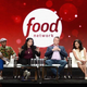 Food Network stars at a public event on stage